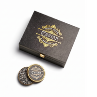 American Paddlefish Caviar Gift Box with original ornate packaging, centered on white